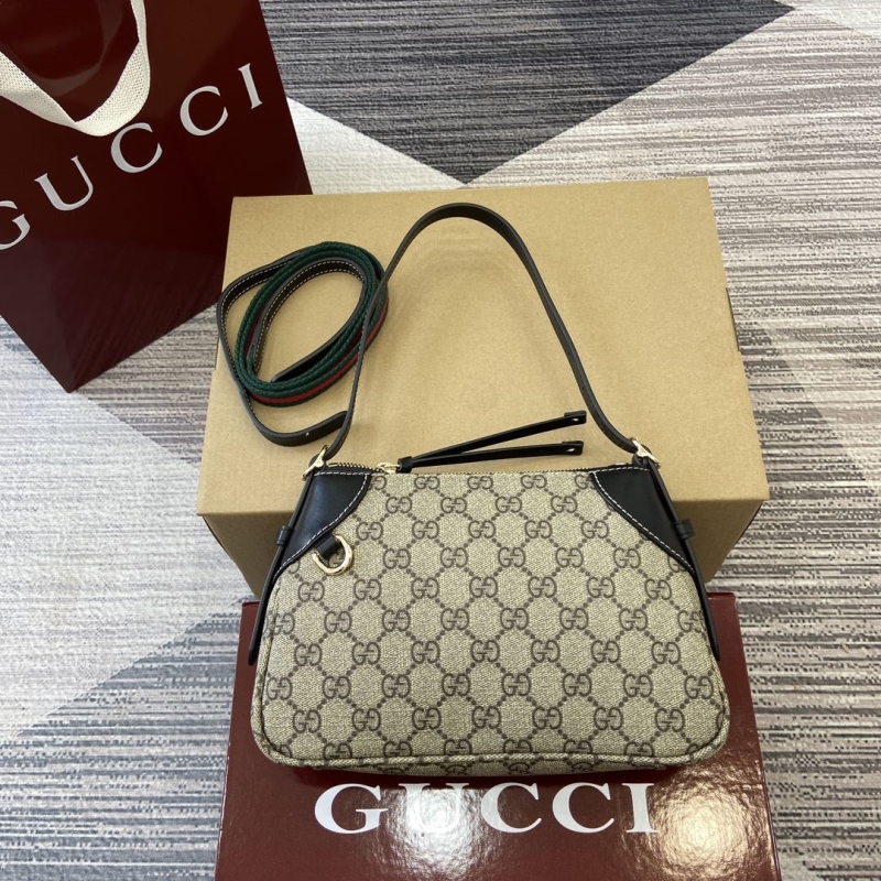 G*u*i top handle bags